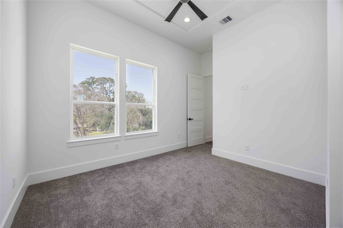 324 Janisch Road Houston, TX 77018 - Photo 11 of 18 Third-floor secondary bedroom featuring its own en suite bath for convenience and privacy.