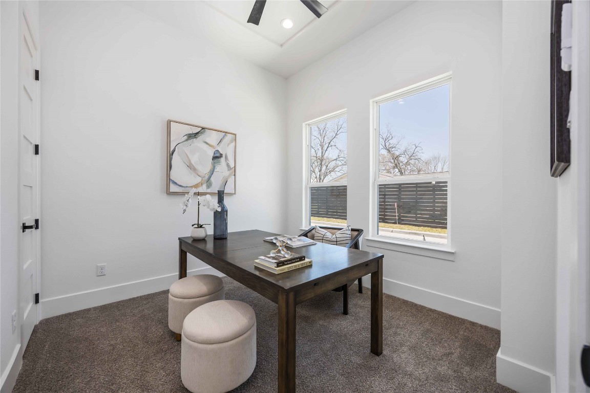 324 Janisch Road Houston, TX 77018 - Photo 15 of 18 Versatile first-floor secondary bedroom ideal for a guest suite or private office, with an attached full bath and walk-in closet.