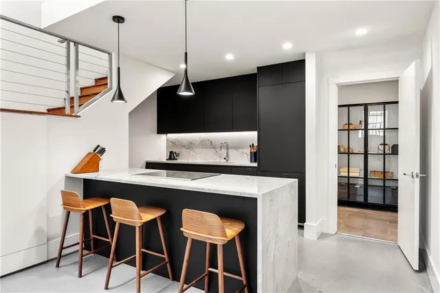 a kitchen with a sink and a window