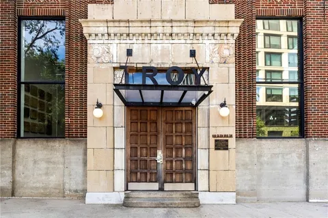 a view of a livingroom with furniture and a ceiling fan
