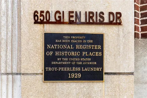 a workspace with furniture and a window