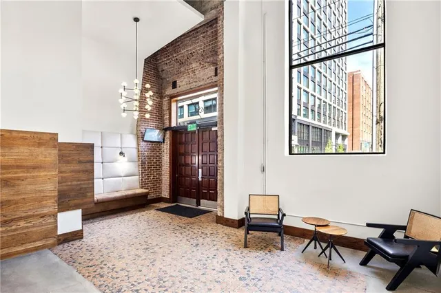 a view of a chair and table in the patio