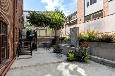 a view of a building and a street