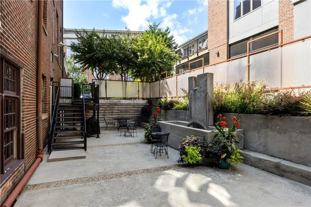 a view of a building and a street