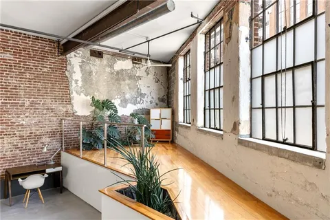 a view of outdoor space with a large trees