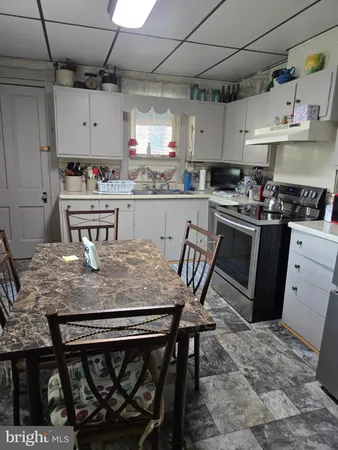 a room with furniture and a window