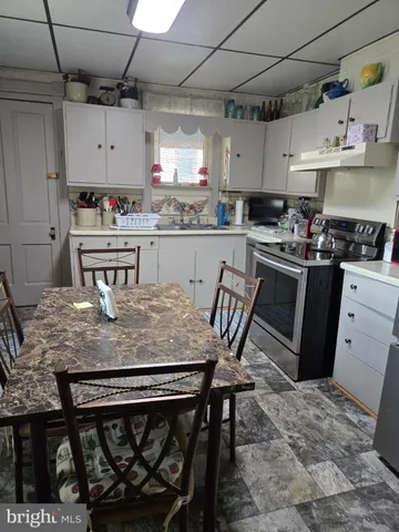 a room with furniture and a window