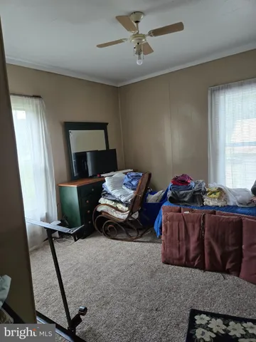 a bed room with a bed and a chandelier