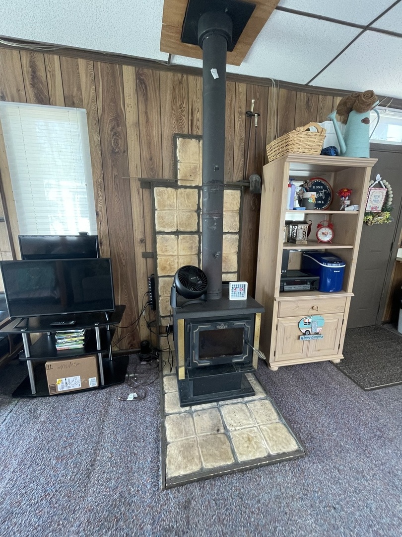 21-154 Woodhaven Lakes Sublette, IL 61367 - Photo 5 of 15 a room with furniture and a fireplace