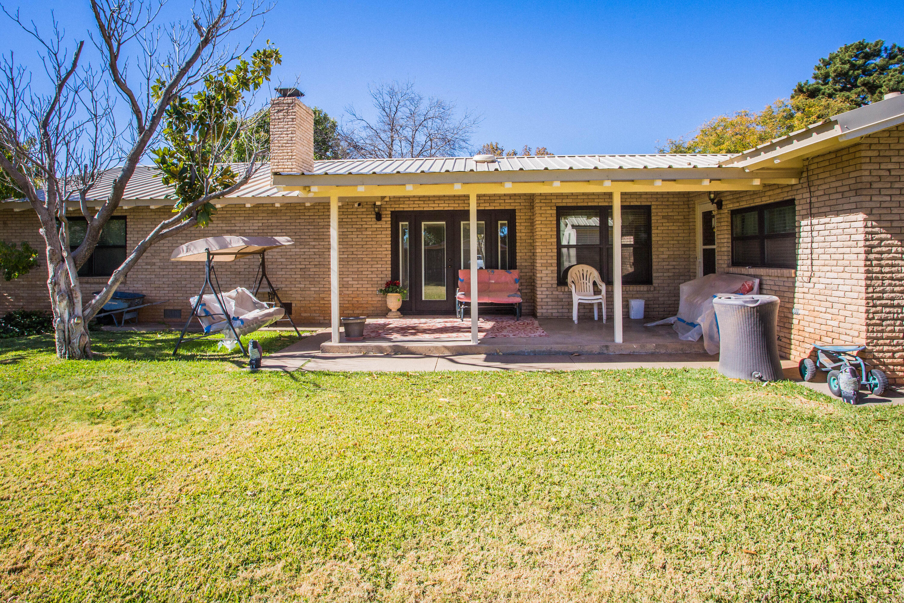 1208 Dallas Plainview, TX 79072 - Photo 18 of 24 a view of a house with patio