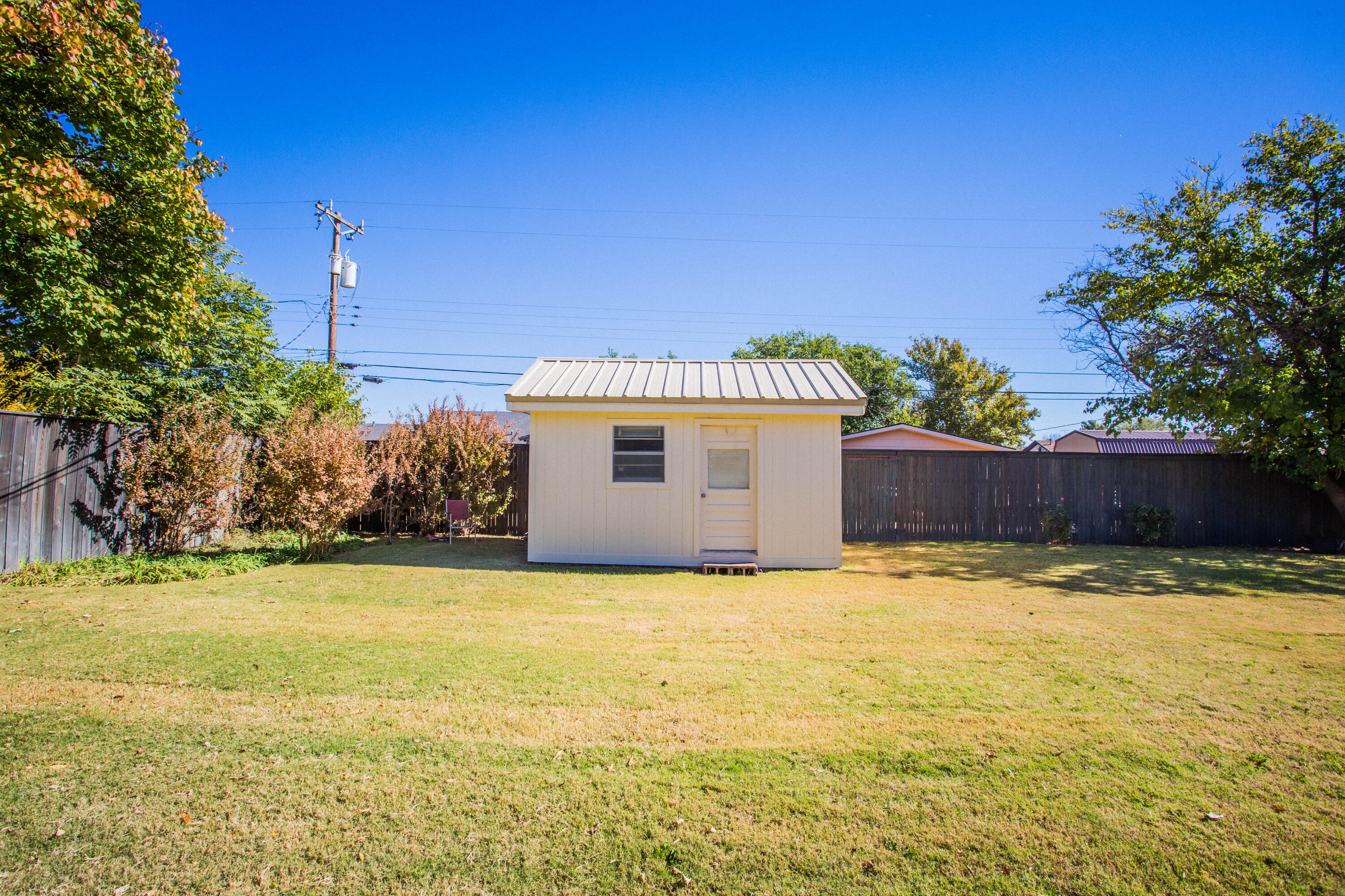 1208 Dallas Plainview, TX 79072 - Photo 20 of 24 a view of a swimming pool with an outdoor space and seating area