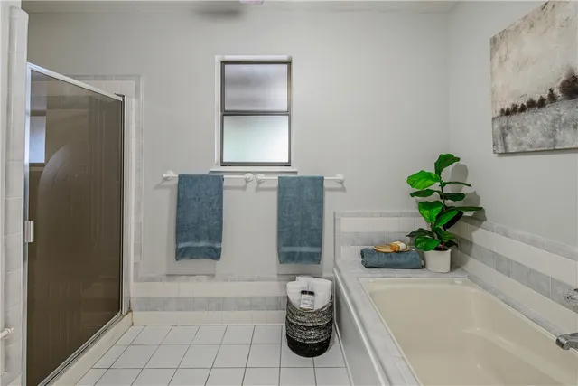 a bathroom with a sink a toilet a mirror and vanity