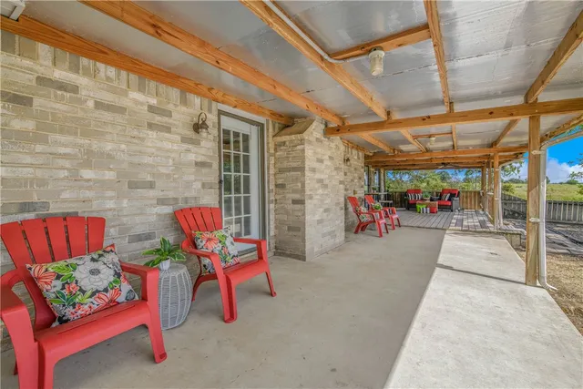 a backyard of a house with lots of green space