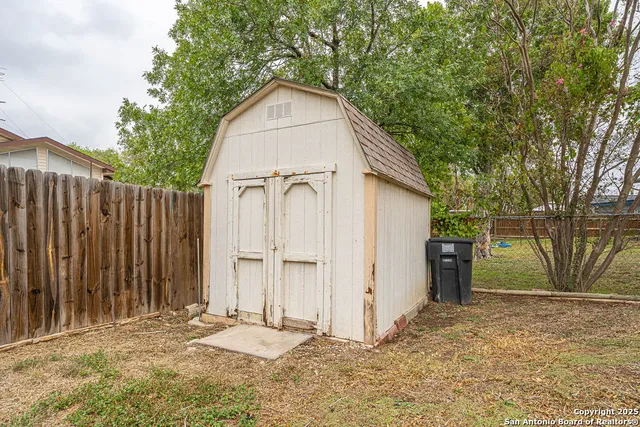 a view of backyard of house
