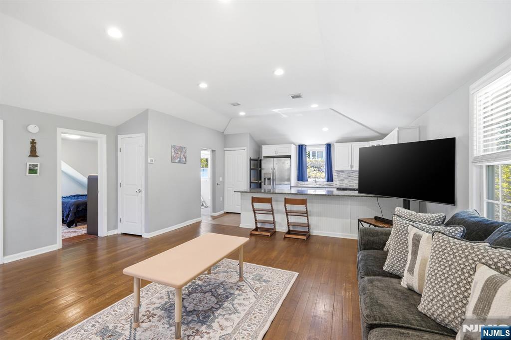 6 Timberwood Lane Oak Ridge, NJ 07438 - Photo 17 of 44 a living room with furniture and a flat screen tv