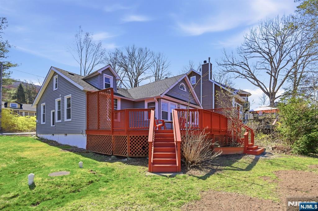 6 Timberwood Lane Oak Ridge, NJ 07438 - Photo 2 of 44 a view of a house with a yard