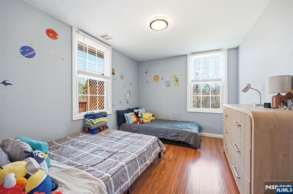 6 Timberwood Lane Oak Ridge, NJ 07438 - Photo 22 of 44 a bedroom with bed and window