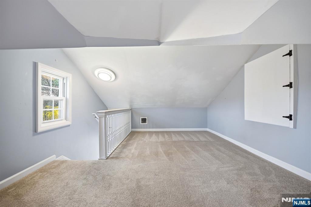 6 Timberwood Lane Oak Ridge, NJ 07438 - Photo 33 of 44 a view of an empty room with a window
