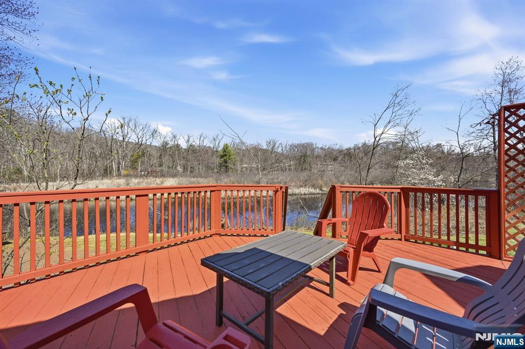 6 Timberwood Lane Oak Ridge, NJ 07438 - Photo 36 of 44 a view of a chairs and table on the terrace
