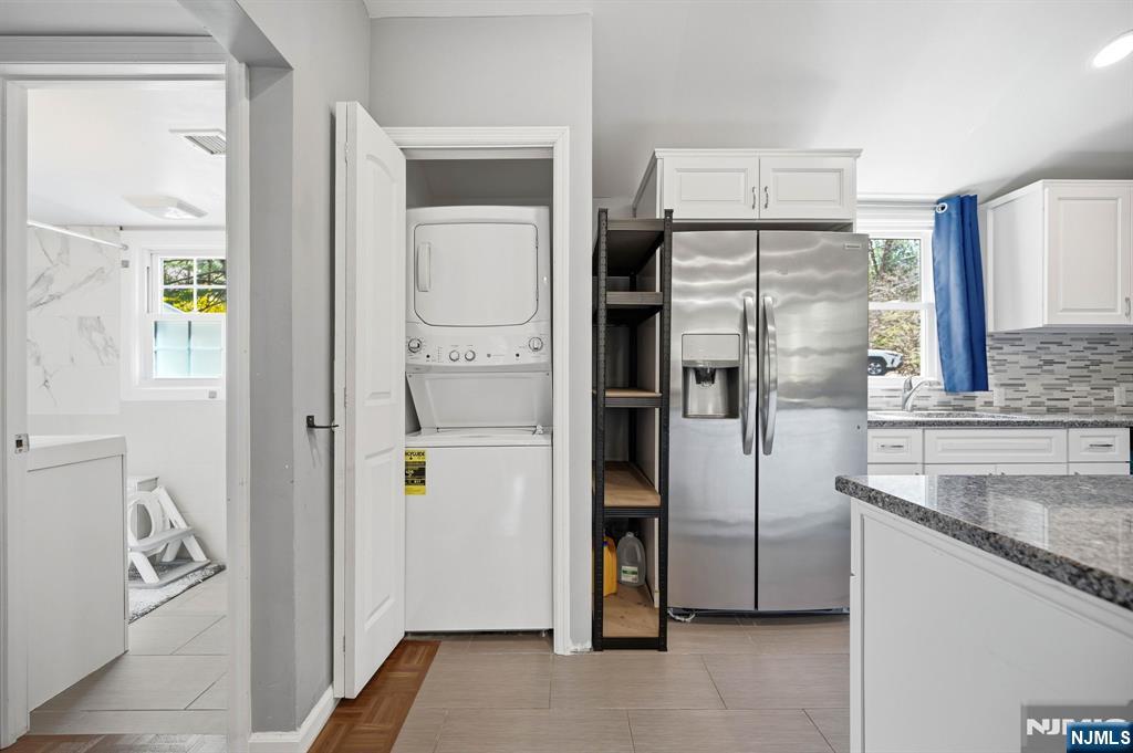 6 Timberwood Lane Oak Ridge, NJ 07438 - Photo 9 of 44 a kitchen with stainless steel appliances granite countertop a refrigerator and a sink