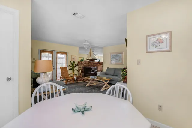 a view of living room and kitchen with furniture