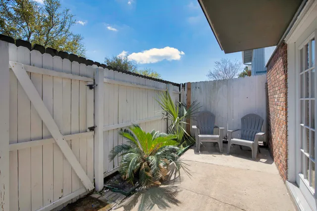a potted plant sitting in front of a building
