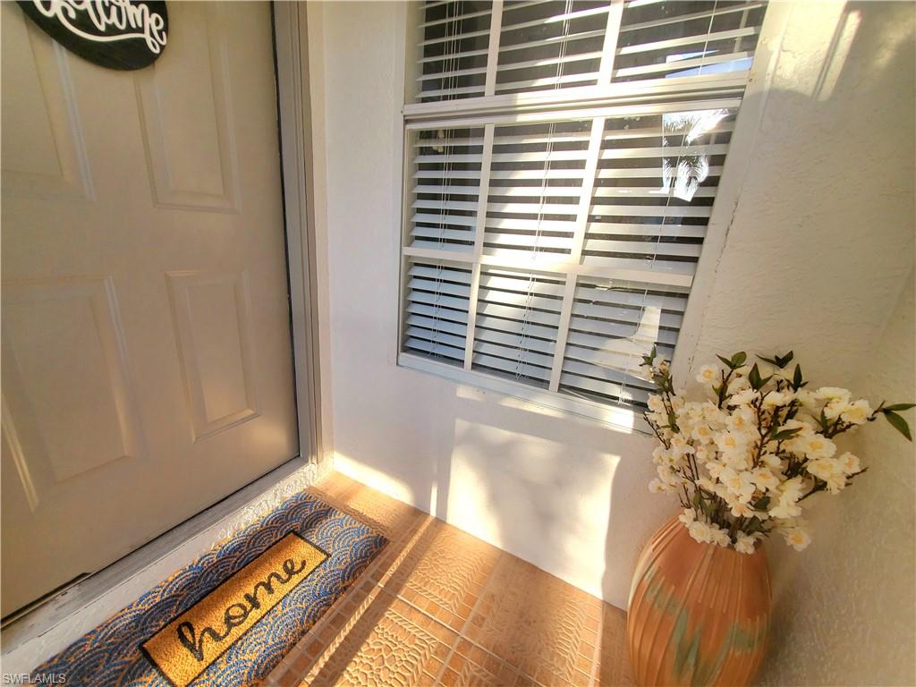 992 Marblehead Drive Naples, FL 34104 - Photo 2 of 50 a view of a potted plant in a room