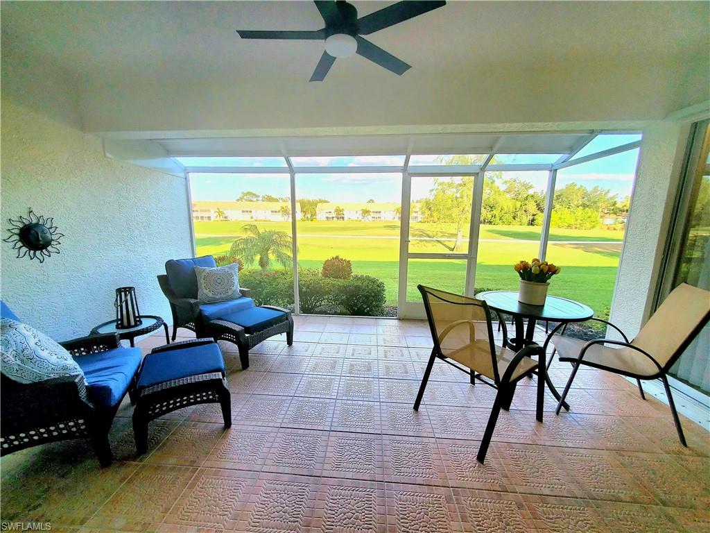 992 Marblehead Drive Naples, FL 34104 - Photo 3 of 50 a living room with furniture and a large window