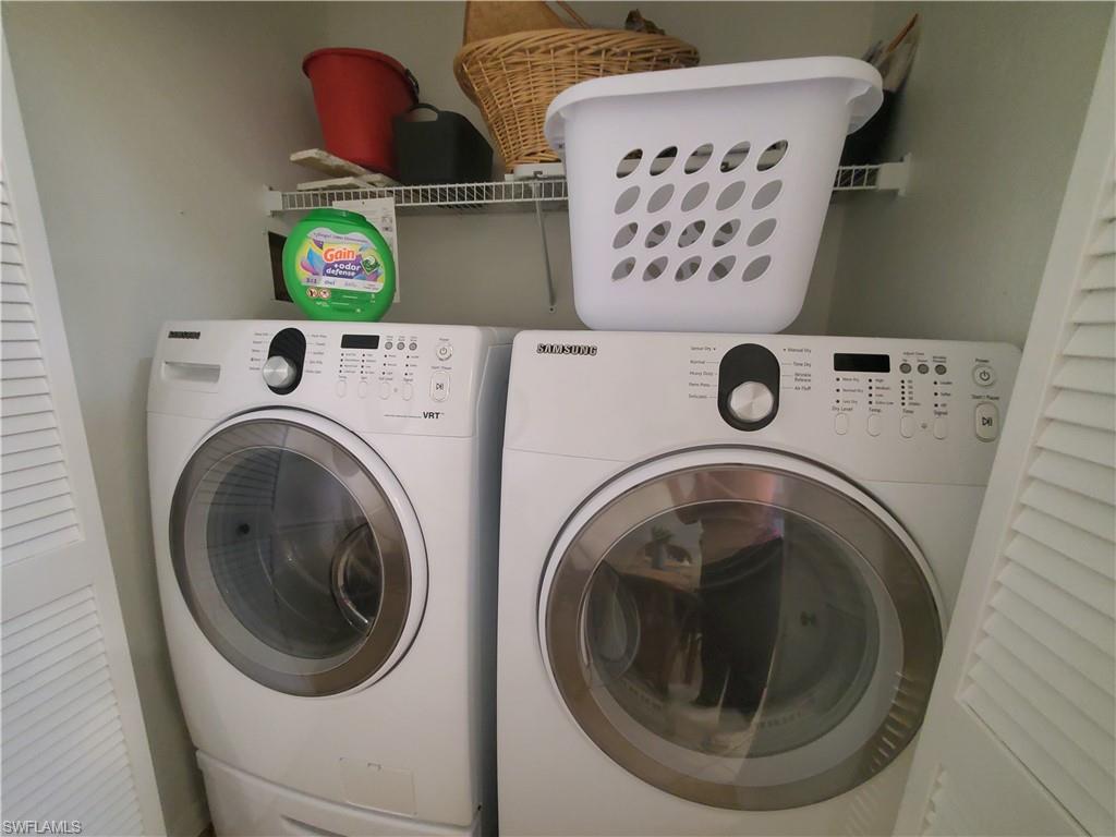 992 Marblehead Drive Naples, FL 34104 - Photo 42 of 50 a utility room with dryer and washer