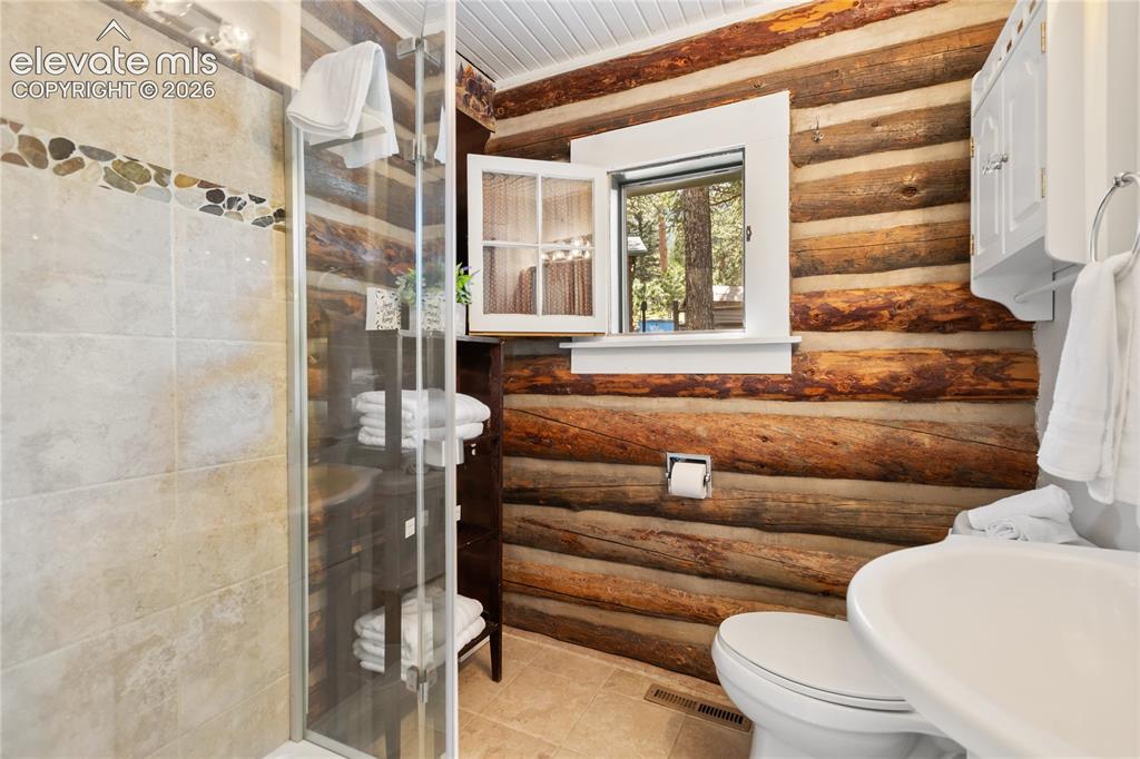9120 Ute Road Cascade, CO 80809 - Photo 21 of 38 A nicely remodeled bathroom too!