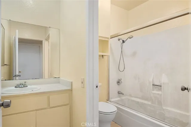 a view of a house with a iron fence