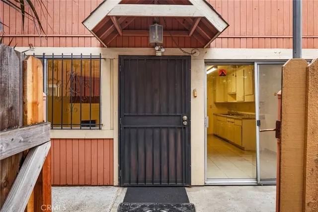 a view of a door and wooden door