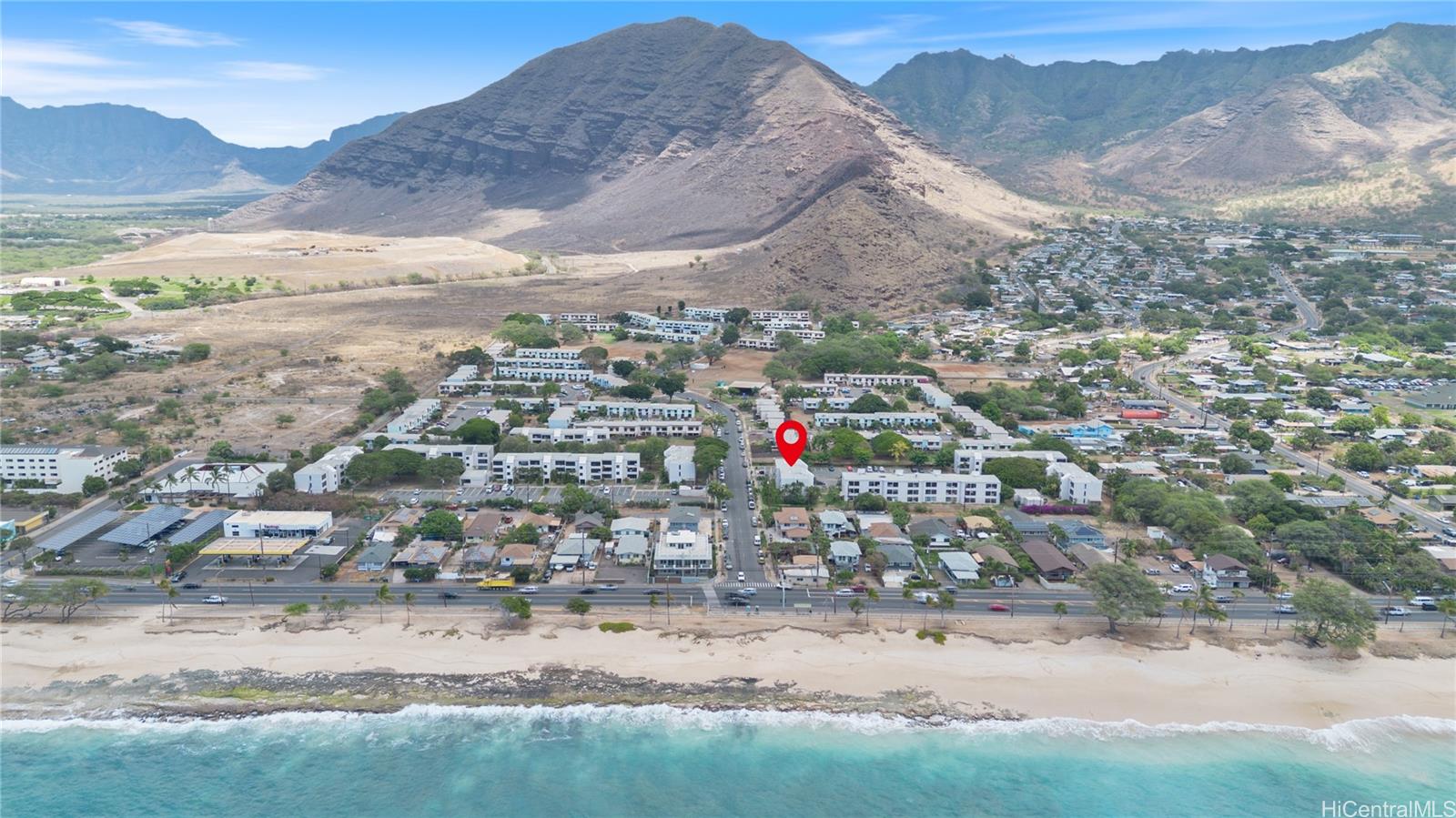 87-119 Helelua Street, Unit F204 Waianae, HI 96792 - Photo 22 of 24 an aerial view of residential house and sandy dunes