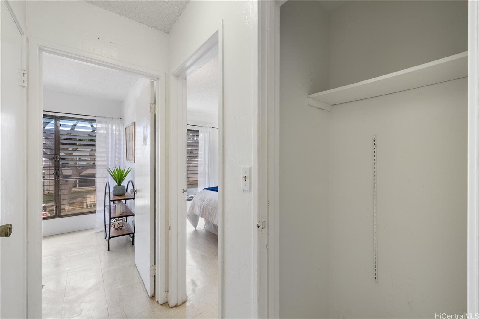 87-119 Helelua Street, Unit F204 Waianae, HI 96792 - Photo 10 of 24 a view of a hallway and interior of the house
