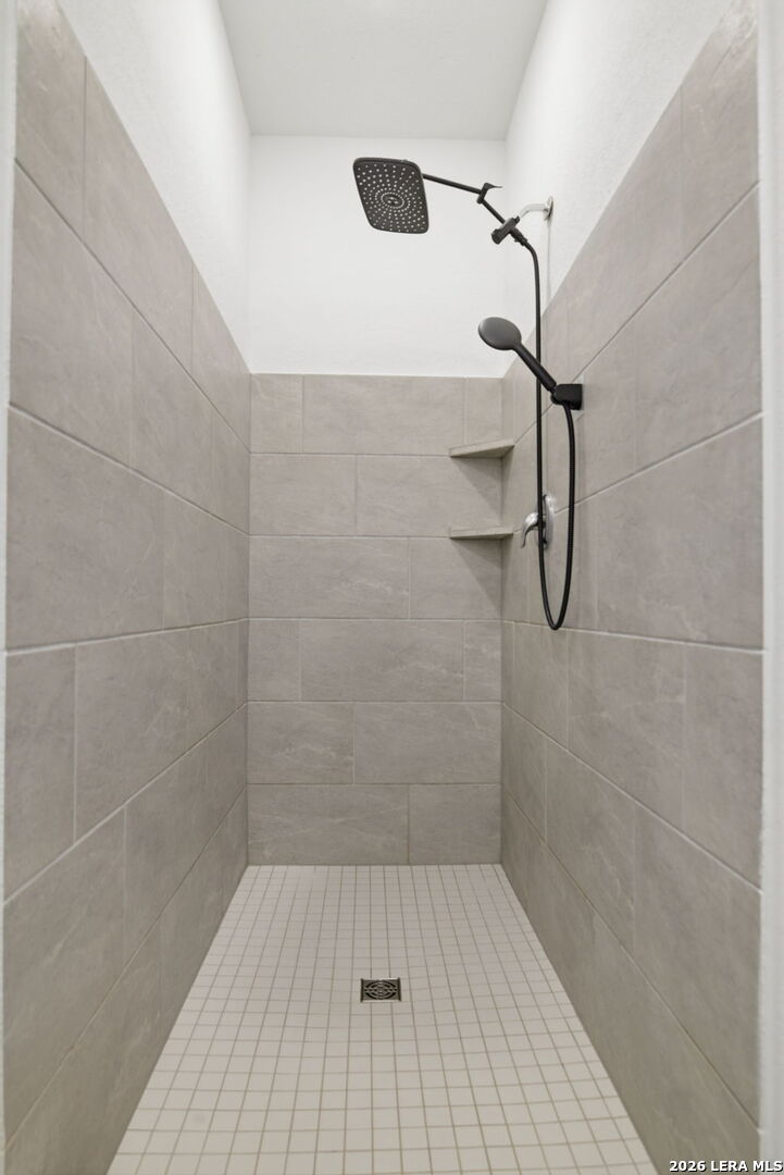 12811 Sage Turn St. Hedwig, TX 78152 - Photo 16 of 28 a bathroom with a shower
