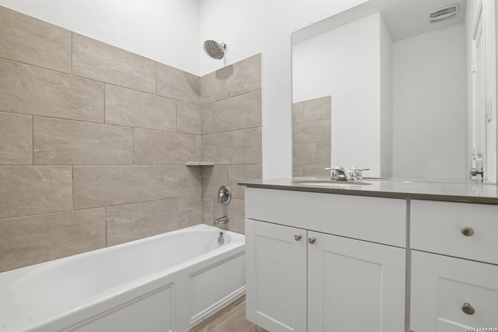 12811 Sage Turn St. Hedwig, TX 78152 - Photo 22 of 28 a bathroom with a bathtub and vanity