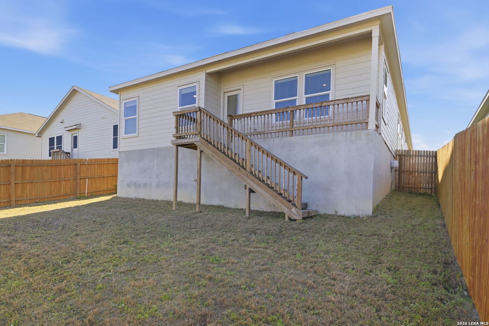 12811 Sage Turn St. Hedwig, TX 78152 - Photo 27 of 28 a view of a house with a yard and garage