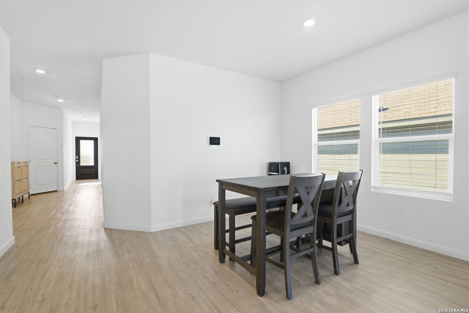 12811 Sage Turn St. Hedwig, TX 78152 - Photo 5 of 28 a view of a dining room with furniture and window