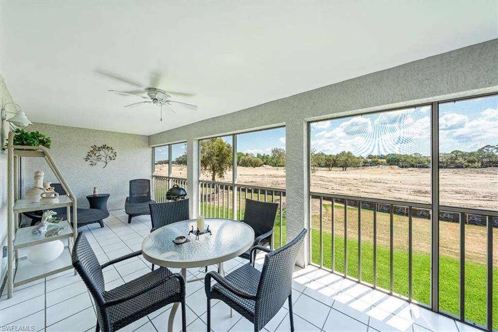 231 Via Perignon, Unit 204 Naples, FL 34119 - Photo 26 of 26 a view of a dining room with furniture window and outside view