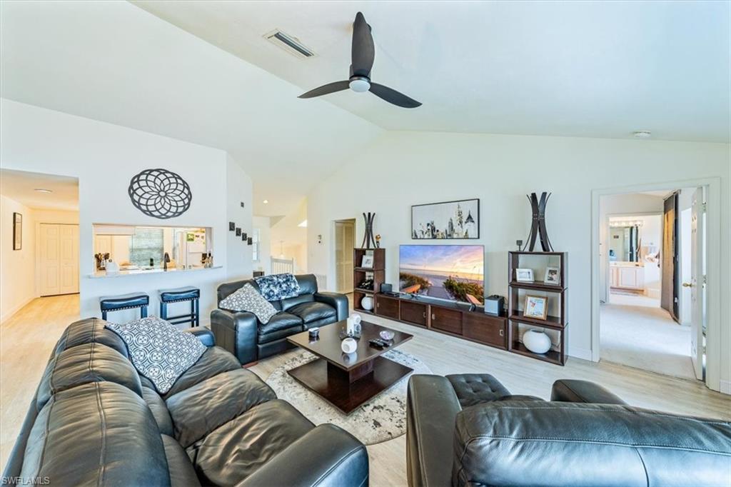 231 Via Perignon, Unit 204 Naples, FL 34119 - Photo 7 of 26 a living room with furniture