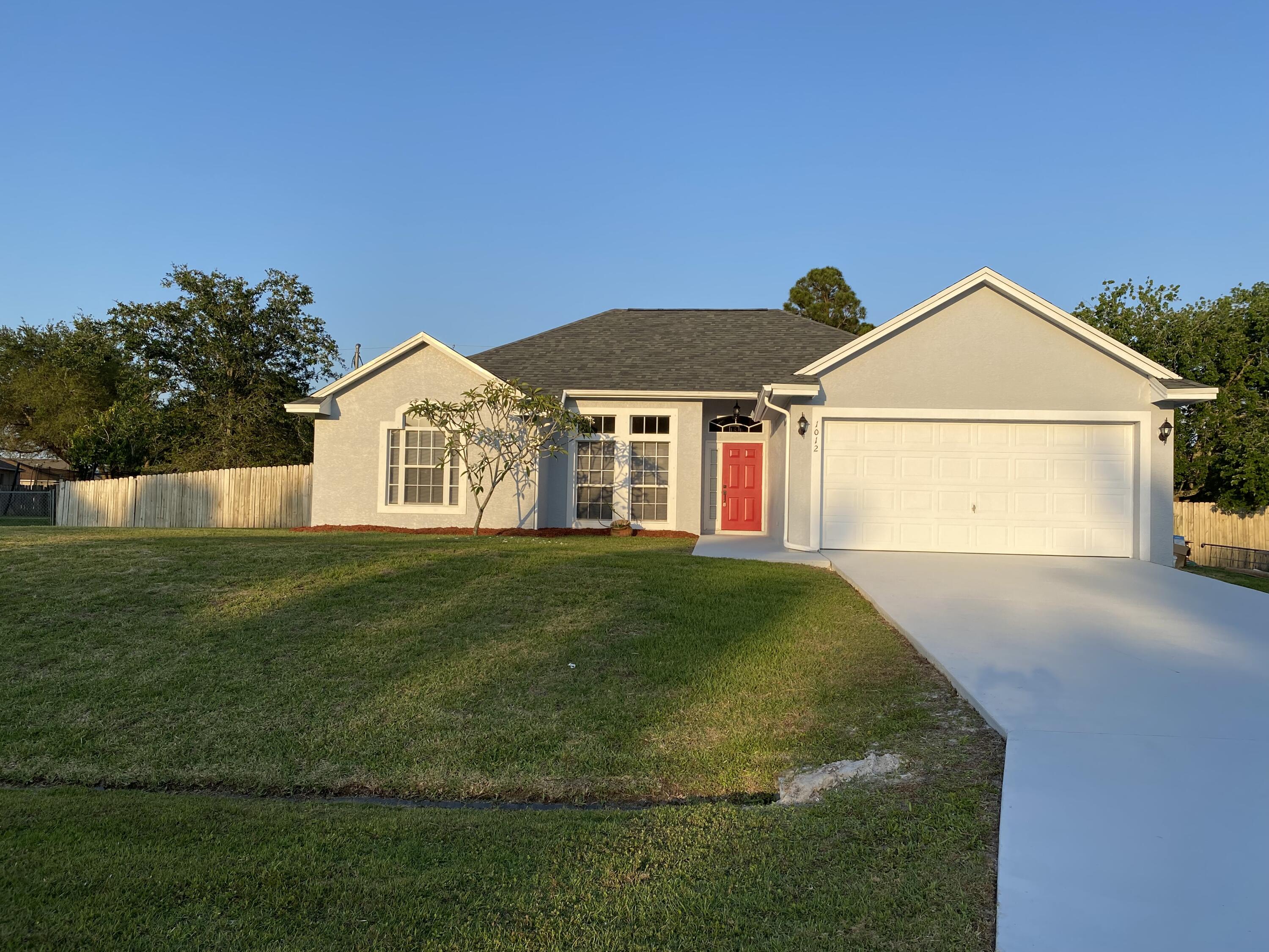 1012 Southwest Longfellow Road Port St. Lucie, FL 34953 - Photo 4 of 60 IMG-5356