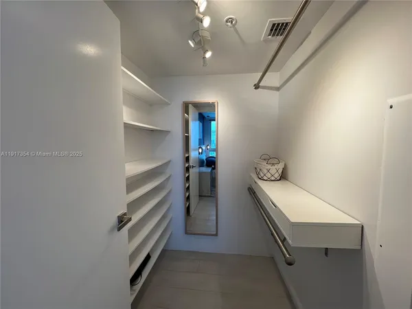 a room with storage and utility