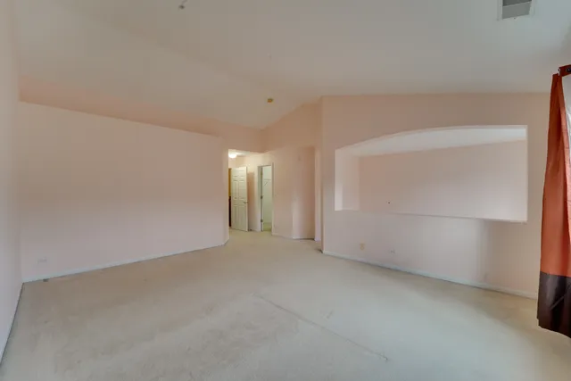 a bathroom with a double vanity sink a mirror and a shower
