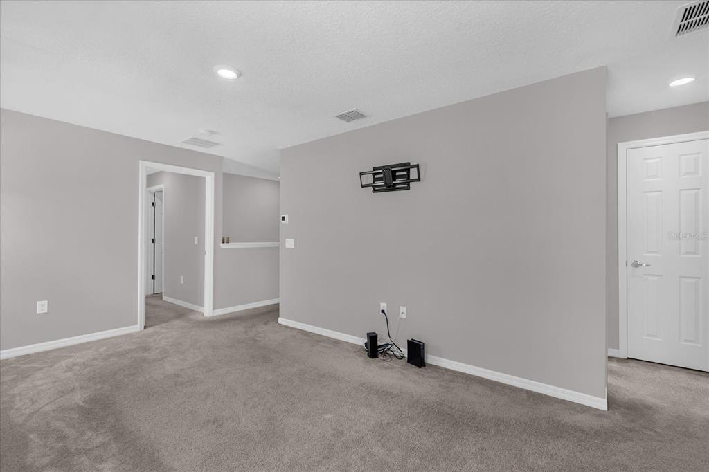 3470 Beau Road Kissimmee, FL 34746 - Photo 15 of 40 an empty room with windows