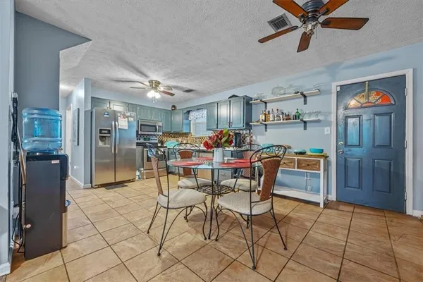 a view of a dining room with furniture
