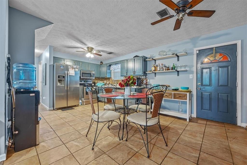 145 Turning Point Stockbridge, GA 30281 - Photo 12 of 21 a view of a dining room with furniture