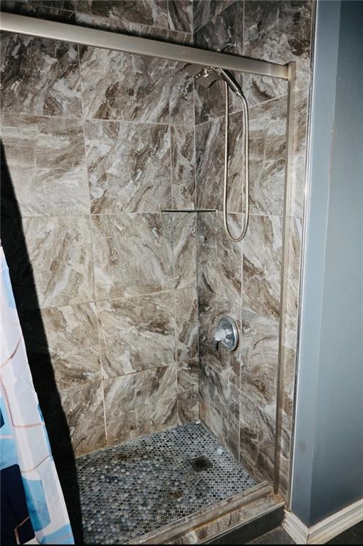 145 Turning Point Stockbridge, GA 30281 - Photo 16 of 21 a bathroom with a shower