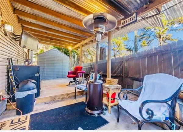 a view of a chairs in patio