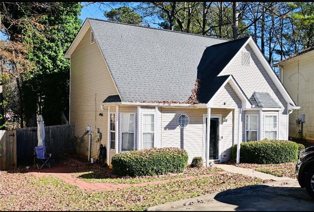 145 Turning Point Stockbridge, GA 30281 - Photo 2 of 21 a view of a white house next to a yard