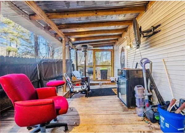 a room with furniture and gym equipment